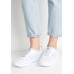 Кроссовки WMNS NIKE TANJUN SLIP Nike